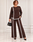 Blouse and trouser set made from polyester, viscose and lycra, with an elegant design, for everyday and office clothing.