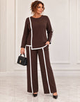 Blouse and trouser set made from polyester, viscose and lycra, with fashionable design, suitable for everyday style.