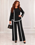 Blouse and trouser set made from polyester, viscose and lycra, model with elegant design and comfortable cut.