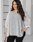 Conjunto con blusa de gasa