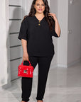 Set camicetta e pantaloni con bottoni