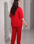 Conjunto blusa y pantalón abotonado