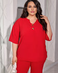 Conjunto blusa y pantalón abotonado