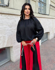 Set with wide-leg trousers made from polyester and lycra, image of fashionable women's set with comfortable design.