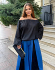 Set with wide-leg trousers made from polyester and lycra, image of elegant model, suitable for everyday and formal clothing.