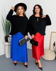 Satin dress and soft jumper set made from polyester, viscose and elastane, with an elegant design, shown in the photo.