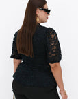 Lace blouse made from cotton and nylon with delicate lace design, white and elegant for everyday style.