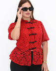 Lace blouse made from cotton and nylon with delicate lace design, suitable for elegant everyday style.