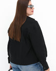 Cropped denim jacket made from cotton and polyester, with elastane, model from a popular brand, shown in the image.