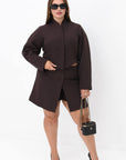 Stylish blazer, skirt and shorts set made from polyester, lycra and nylon, model from a fashion brand, image of garments.