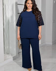 Completo blusa e pantaloni in pizzo