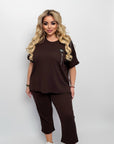 Set with cropped shorts от cotton, polyester и elastane, показан на изображението.