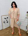 Set of tie-front blouse and bermuda shorts , linen и polyester, подходящ за летни елегантни облекла.