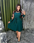 Flared dress with mesh sleeves