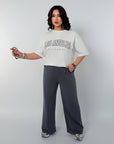 Knitwearен комплект с надпис NewYear25, 80% cotton, 15% polyester, 5% elastane, изображение на дрехи.