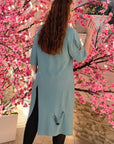 Set of tunic with cut-out details and leggings от cotton, polyester и elastane, на изображението.