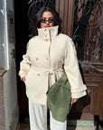 Short cashmere coat with warm lining, part of a set, made from polyester and viscose, stylish and warm winter clothing.
