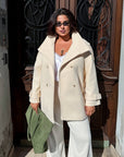 Short cashmere coat with warm lining, part of a set, polyester and viscose, image of elegant model.