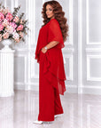 Chiffon set with an asymmetrical blouse and cotton and polyester composition, image of a model with elegant outfit.