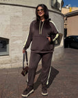 Hooded velvet set, composition of viscose, cotton and elastane, in gentle tones, shown in the image.