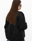 Stylish velvet bomber jacket made from viscose, cotton and elastane, with fashionable design, suitable for everyday style.