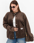 Stylish velvet bomber jacket in a viscose blend, cotton and elastane, with fashionable design and dark colour.