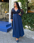 Long embroidered dress made from polyester, model SV082025, with an elegant design and detailed embroidery, image of a model.