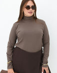 Soft turtleneck jumper from Composition, with white and classic design, suitable for everyday style.
