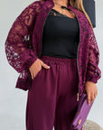 Set with a mesh bomber jacket made from polyester, viscose and spandex, shown on a model, with modern design and elegant style.