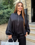 Satin-finish set made from polyester, viscose and elastane, image of elegant set with smooth texture and satin sheen.