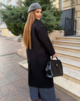 Long faux-cashmere coat in a blend of polyester, viscose and wool, beige, with cut and details in the image.