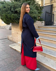 Long faux cashmere coat with a composition of polyester, viscose and wool, model with classic cut and dark colour.