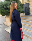 Long faux-cashmere coat with polyester, viscose and wool, with a classic design, suitable for autumn and winter.