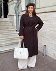 Long faux-cashmere coat with polyester, viscose and wool, shown on a model, suitable for winter style.