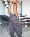 Balloon jeans and shirt made from cotton and polyester, image of the product with white seams and modern cut.