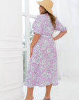 Стилна Floral wrap dress от марка YR, polyester и lycra, показана върху модел.