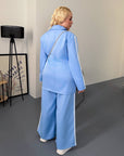 Blazer and wide-leg trouser set in IT style, polyester, viscose and spandex, in fashionable design and comfortable cut.