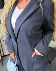 Blazer and wide-leg trouser set in IT style, polyester, viscose and spandex, image of elegant model, fashion choice.