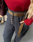 Corduroy trousers from an Italian brand, with viscose, cotton and elastane, lying against a white background.