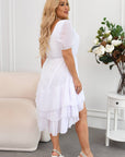Asymmetric dress with ruffles , изработена от viscose и polyester, показана на снимка.