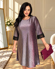 Luxurious loose-fit lurex dress in polyester and elastane, with a sparkling effect and elegant design.