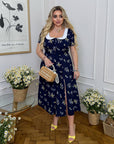 Midi dress with a statement collar
