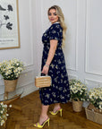 Midi dress with a statement collar