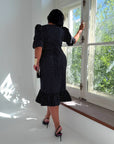 Robe à pois et manches bouffantes
