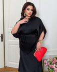 Satin set with a skirt , с Black satin и elastane, показващ елегантен дизайн и гладка текстура.