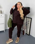 Warm fleece set in polyester and elastane, suitable for winter sports, with an image of a model.