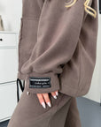 Warm fleece set in polyester and elastane, image of a comfortable and warm winter outfit set.