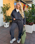 Velour hooded set in polyester and spandex, a soft and stylish outfit in a light colour.