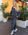 Velour hooded set in polyester and spandex, a soft and stylish sporty outfit.