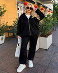 Velour hooded set in polyester and spandex, a fashionable and comfortable sporty outfit.